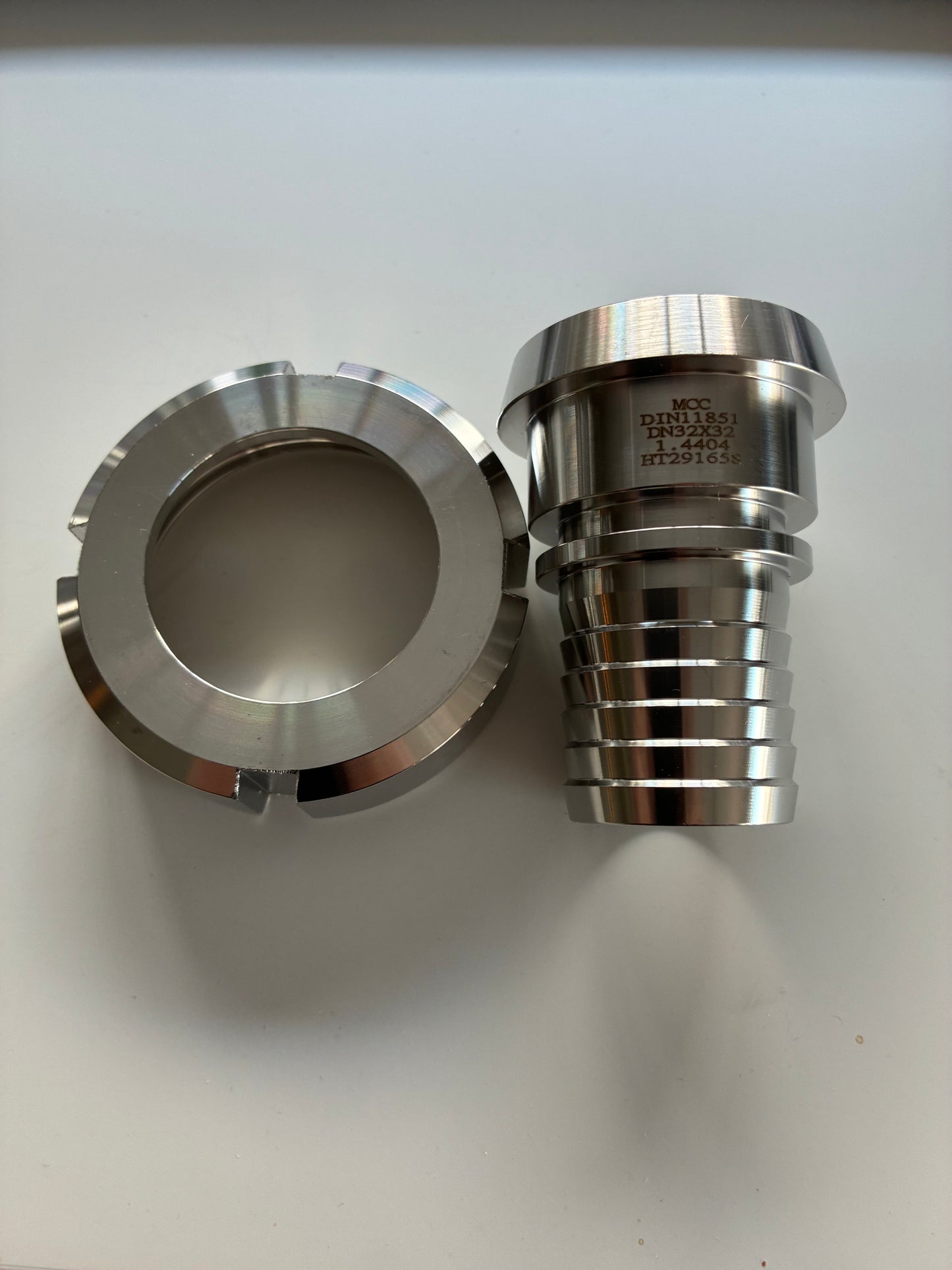 DIN25 koppling med slangnippel 25 mm och slangklämma
